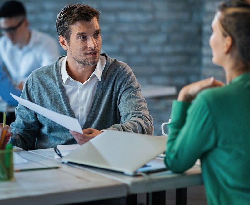 Healthcare recruitment professionals discussing staffing solutions